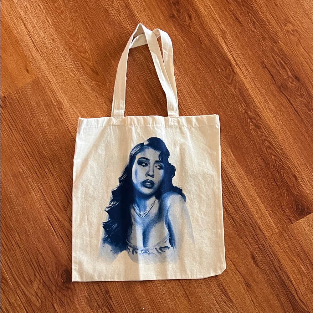 KALI UCHI CONCERT MERCH Elegant Cream Tote with Blue Graphic